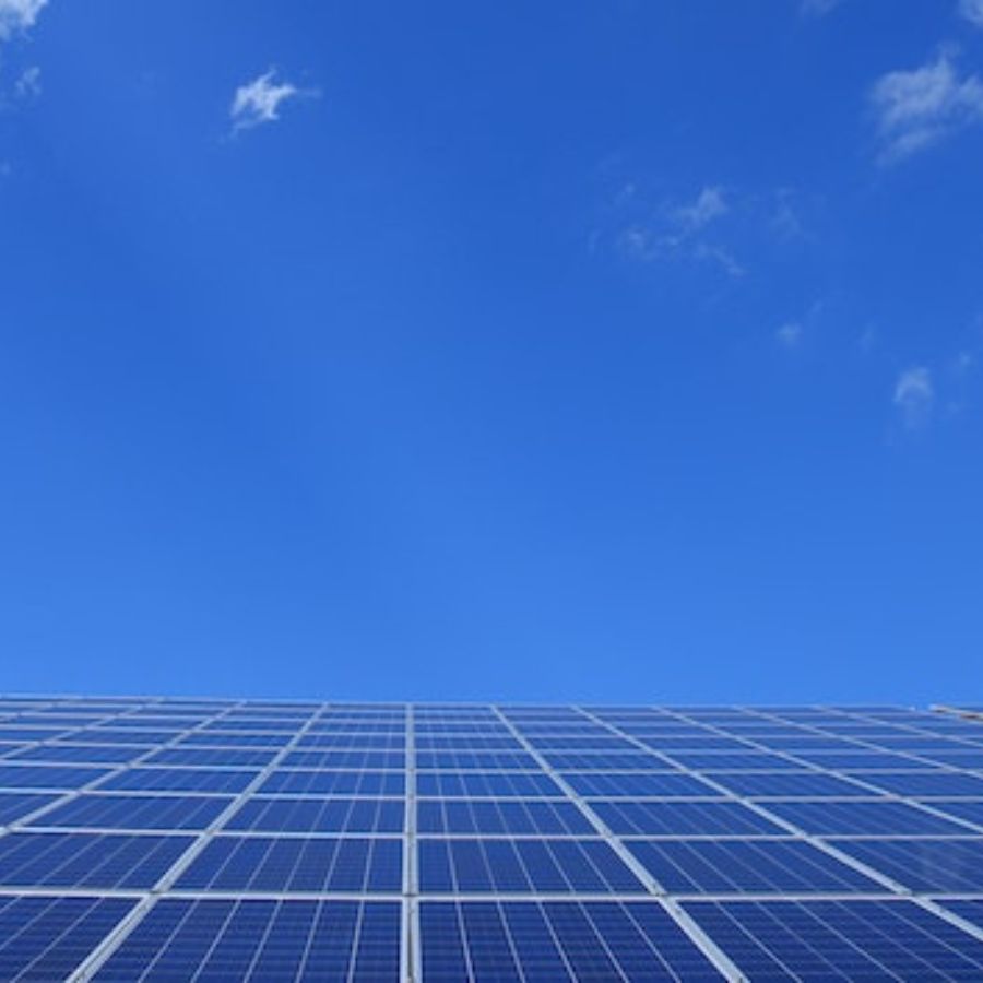 solar panels against a clear blue sky
